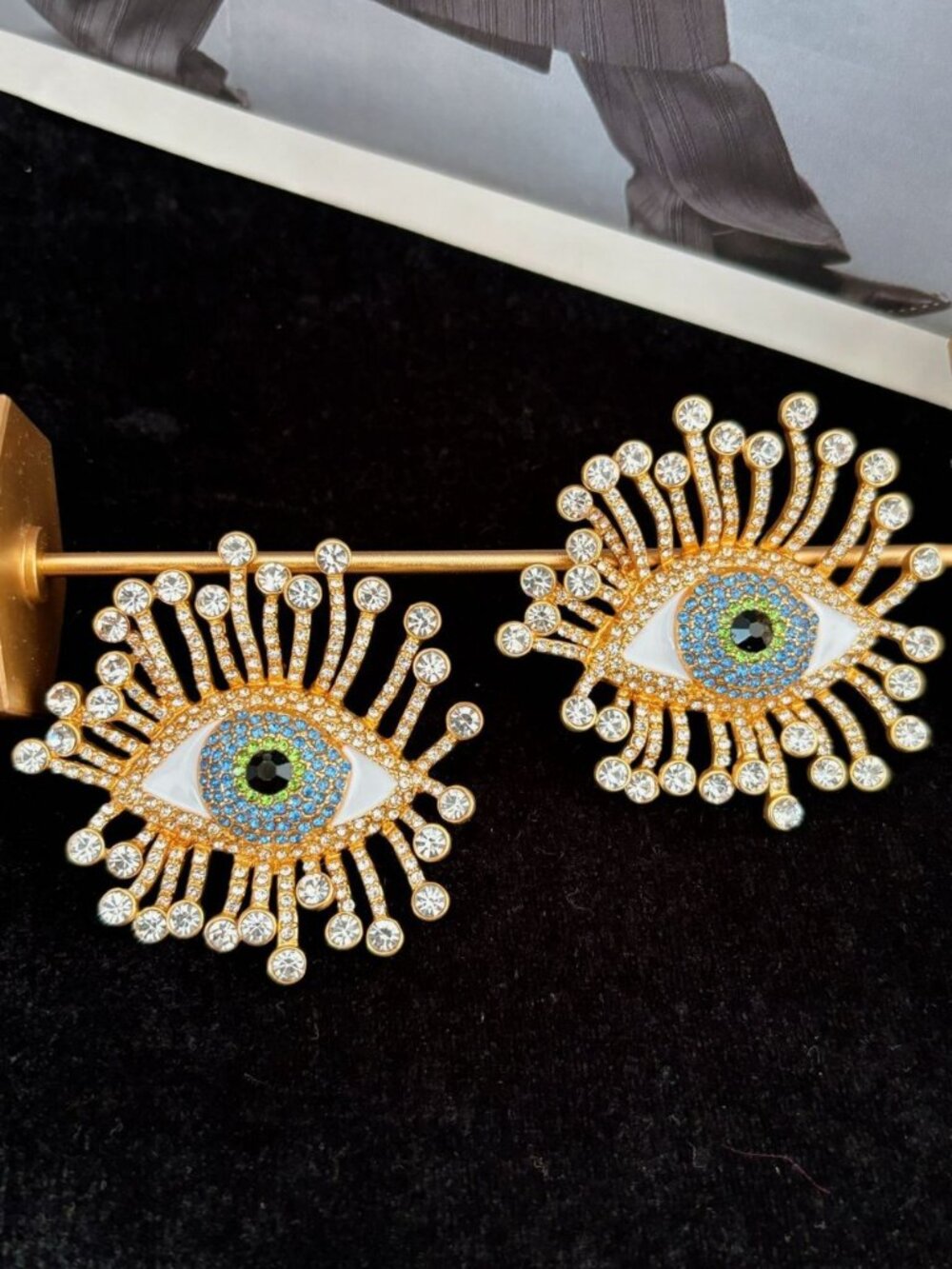 Schiaparelli's exaggerated diamond-studded devil's eye earrings
